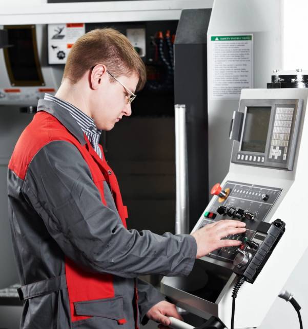 A man working on an industrial machine